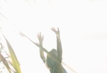 건강한 일상 위한 ‘웰니스 문화’, 일상 속 작은 실천에서 시작된다 woman standing near body of water