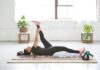 바쁜 일상 속 ‘웰니스 회복’, 나만의 작은 휴식이 건강을 지킨다 woman in black tank top and black leggings lying on black and white floral area rug